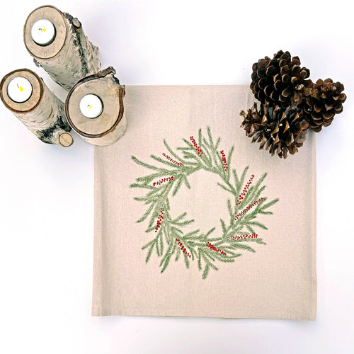 Wreath with berries printed on flour sack tea towel